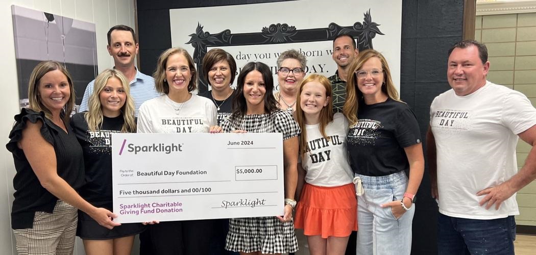 Sparklight gives awards to Beautiful Day and Douglass Community Center
